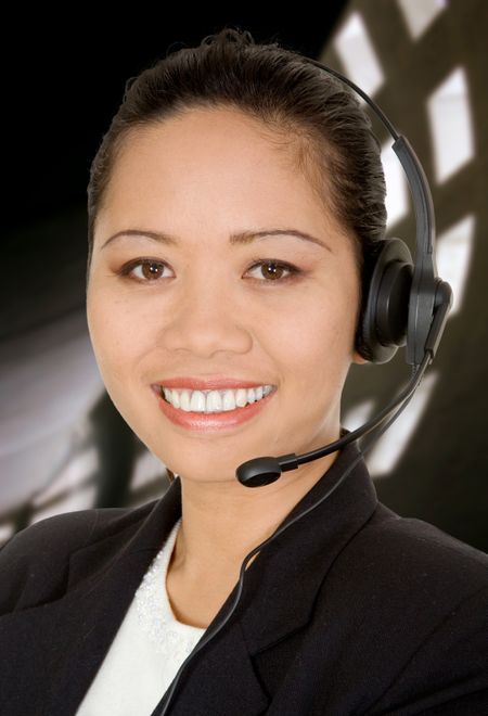 asian business customer support over a dark office background