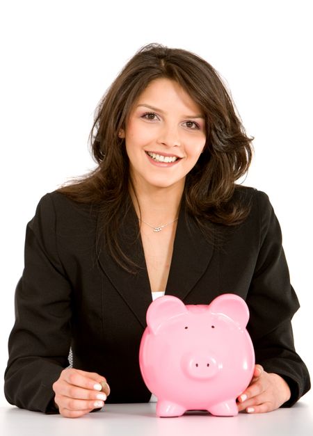 business woman with a piggy bank isolated on white