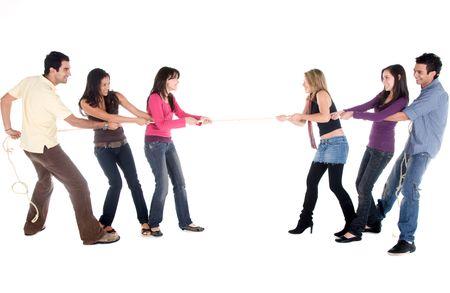 Group of friends competing pulling a rope isolated on white