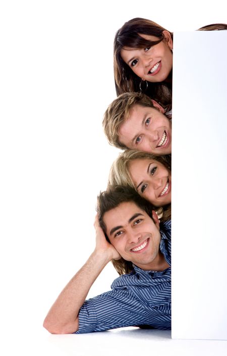 happy group of friends holding a banner add on the floor