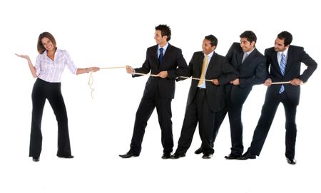 Businesswoman pulling a rope against some businessmen isolated on white