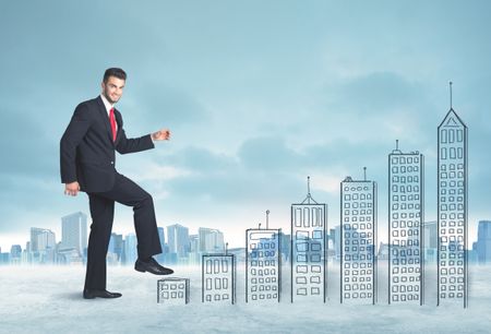 Business man climbing up on hand drawn buildings in city concept
