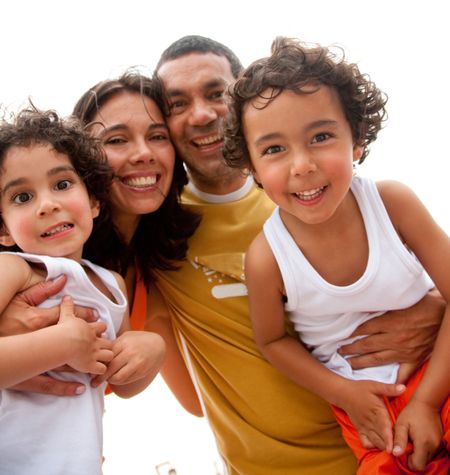 happy family portrait having fun outdoors during a holiday