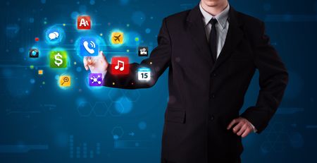 Young businessman pressing various collection of buttons