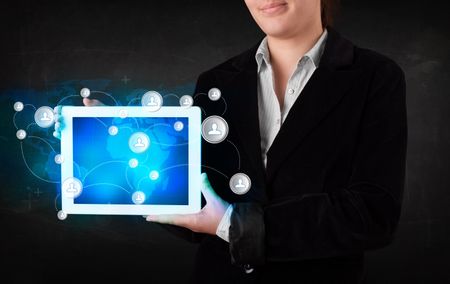 Young person holding talbet with earth communication technology concept