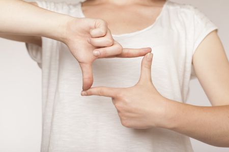 Close up of hands creating a form