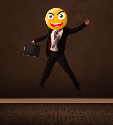 Funny businessman with yellow smiley face