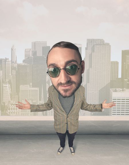 Funny guy with big head, cityscape background