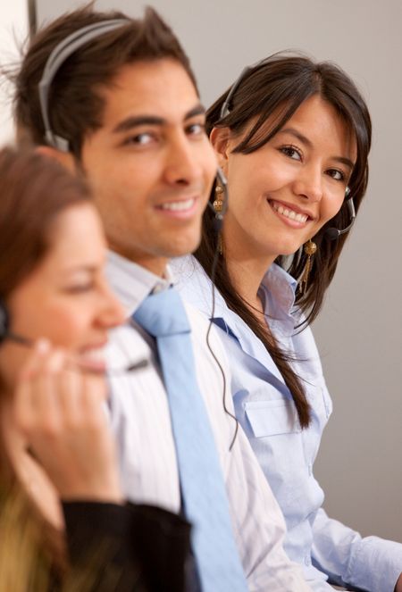 customer services representative team smiling - business concepts
