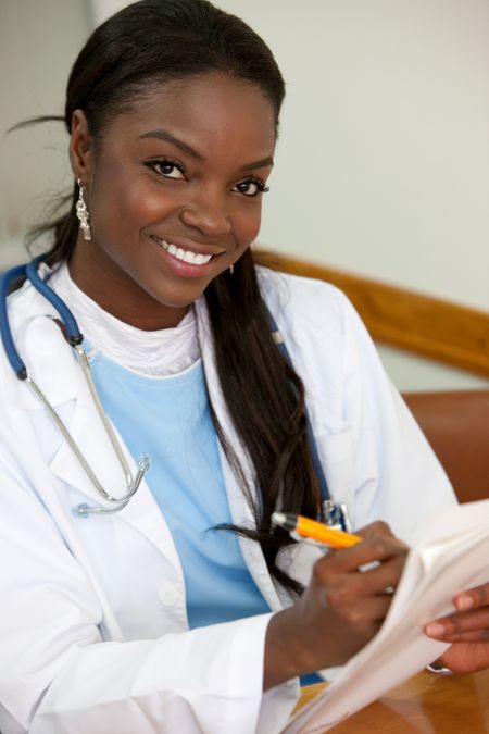 female doctor in a hospital smiling portrait