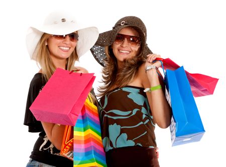 friends smiling with shopping bags - isolated over a white background