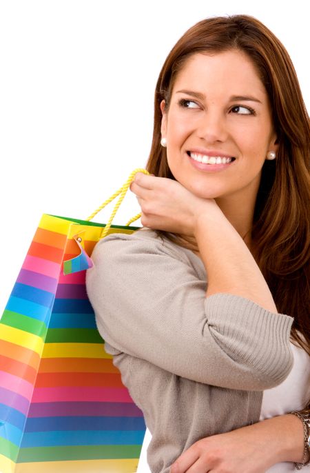 Casual woman shopping bags isolated over a white background