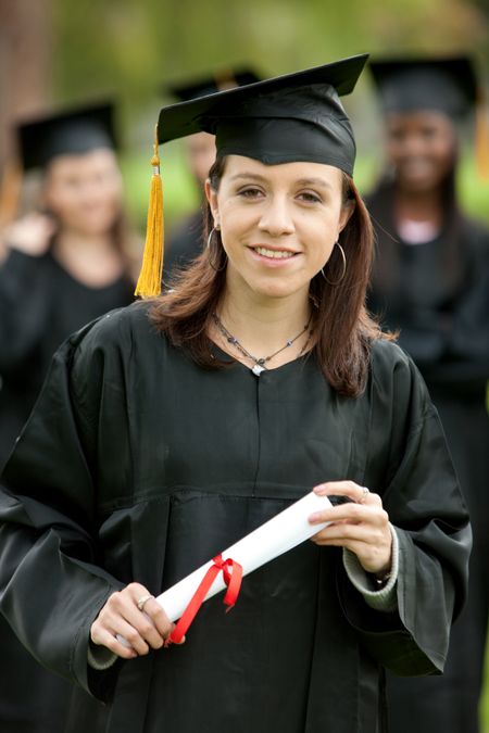 Portrait of a female student holding her diploma