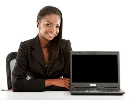 Business woman smiling with laptop isolated over a white background
