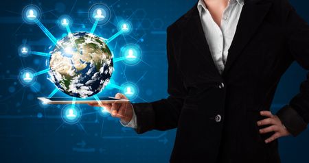 Young woman presenting 3d earth globe in modern tablet