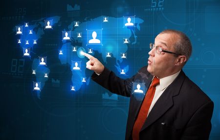 Businessman standing and choosing from social network map