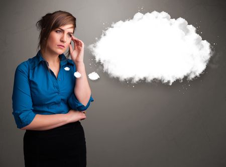 Pretty young lady thinking about cloud speech or thought bubble with copy space