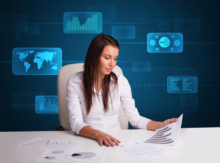 Businesswoman doing paperwork with futuristic digital backgroung