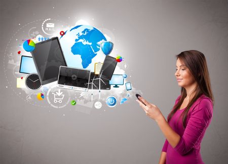 beautiful young woman standing and browsing on her phone