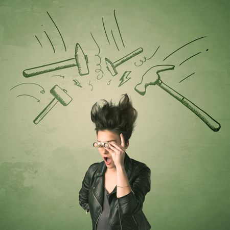 Tired woman with hair style and headache hammer symbols concept on background