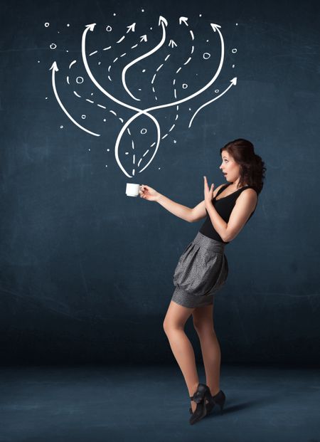 Businesswoman standing and holding a white cup with drawn lines and arrows coming out of the cup 