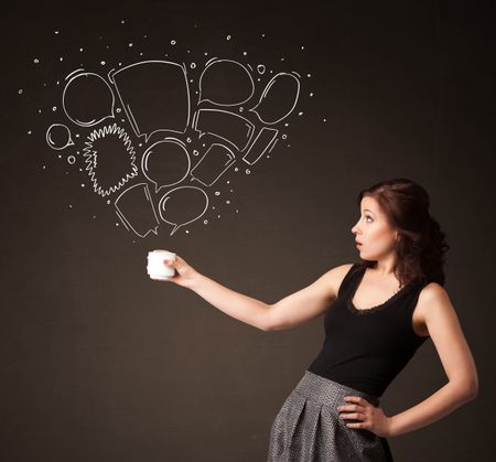 Businesswoman standing and holding a white cup with drawn speech bubbles coming out of the cup