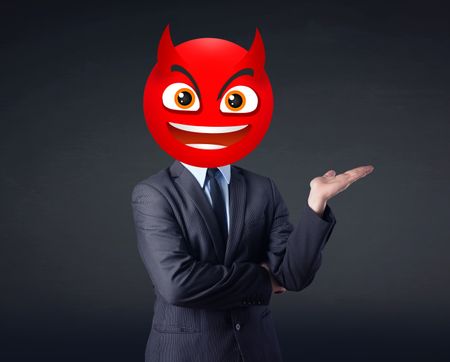 Funny businessman wears devil smiley face