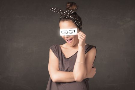 Happy girl looking with hand drawn eye glasses paper concept