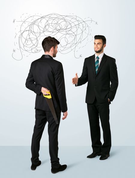 ruthless-businessman-hiding-weapon-weaving-plan-241455586 Ruthless businessman hiding a weapon and weaving plan around his head