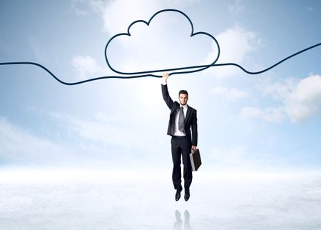 Businessman hanging on a cloud rope 
