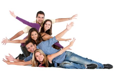 Happy group of friends on the floor with their arms up isolated over a white background