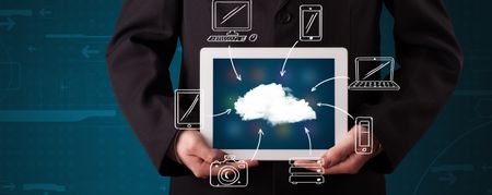 Young businessman showing hand drawn cloud computing