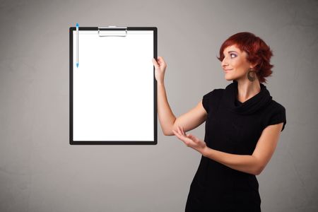 Beautiful young girl holding black folder with white sheet copy space