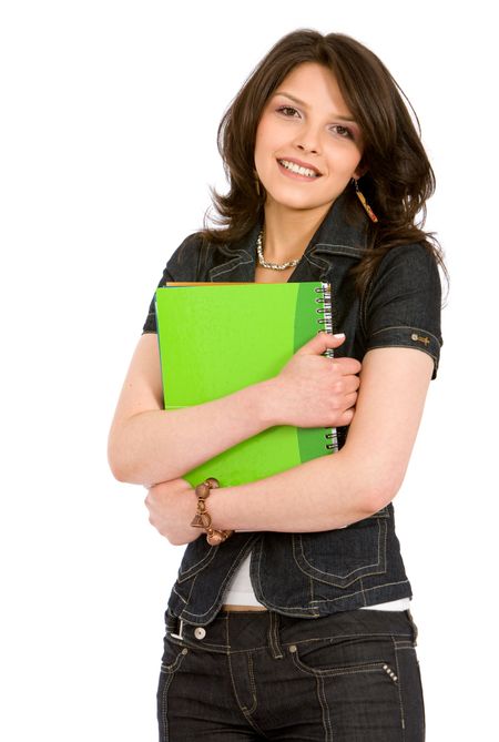 casual female student smiling and holding a notebook - isolated over a white background