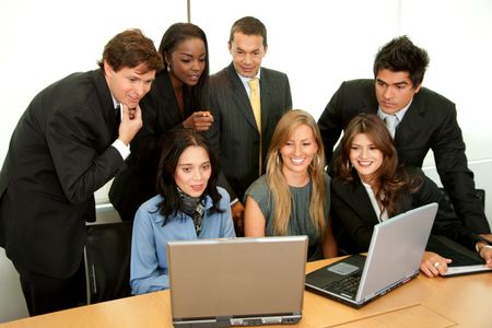 business people in a meeting with a laptop
