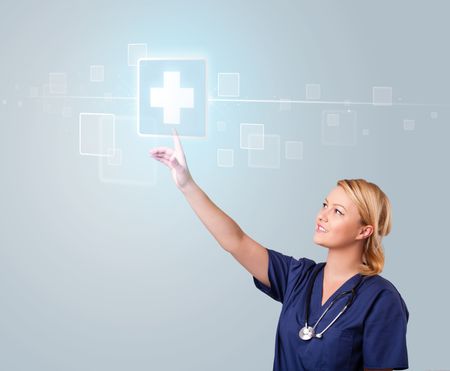 Pretty young nurse pressing modern medical type of buttons
