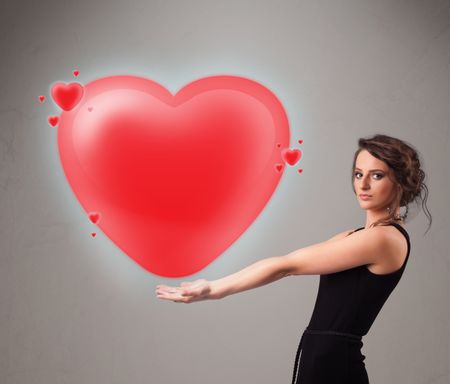 Beautiful young lady holding lovely 3d red heart