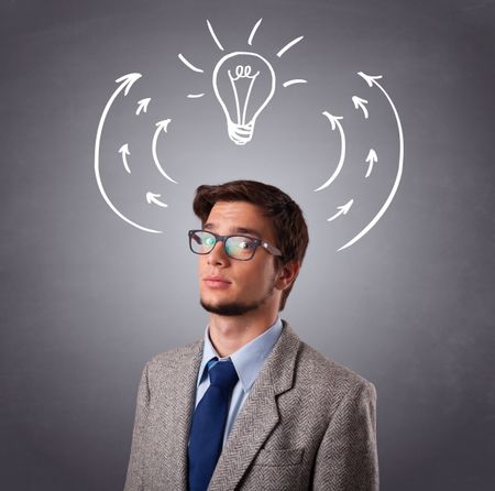 Young man standing and thinking with arrows and light bulb overhead