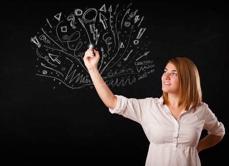 Young girl drawing and skteching abstract lines and symbols 