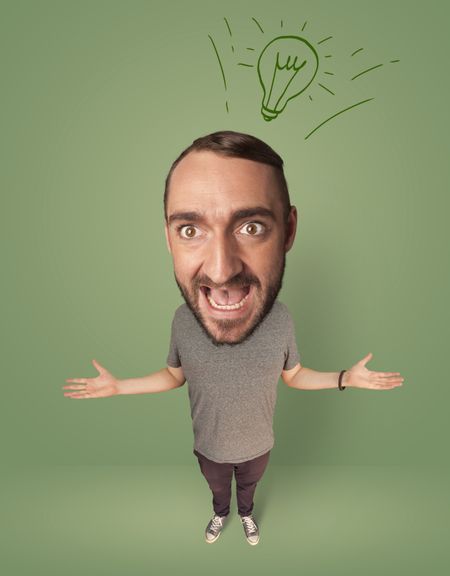 Funny person with big head and drawn idea bulb over it 