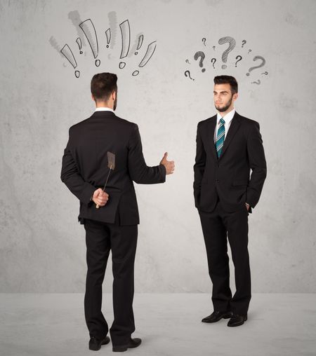 ruthless-businessman-handshake-drawn-exclamation-question-245019406 Ruthless businessman handshake with drawn exclamation and question marks around them head