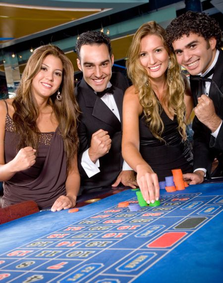 Group of casino gamblers on the roulette