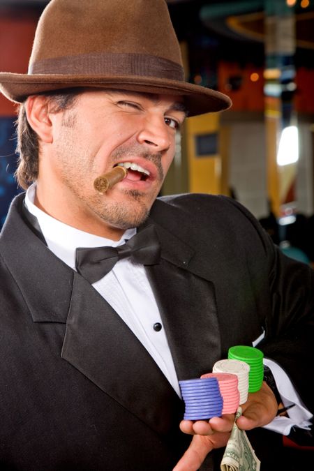 casino man with chips, a cigar and money