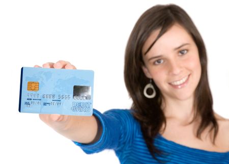 beautiful casual girl holding a business card over a credit card