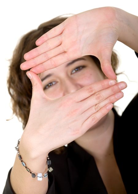 casual girl handframing the shot over a white background - focus is on hands