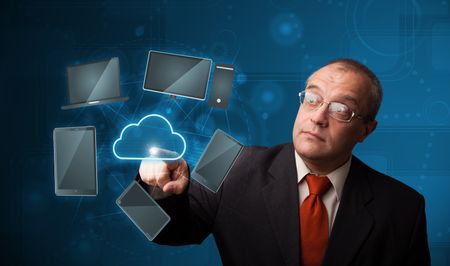 Businessman standing and touching high technology cloud service