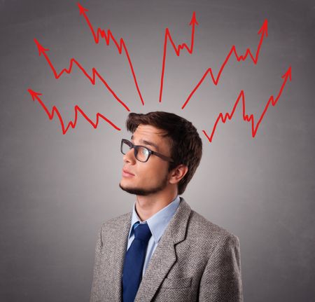 Handsome man standing and thinking with arrows overhead