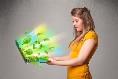 Casual young woman holding notebook with recycle and environmental symbols