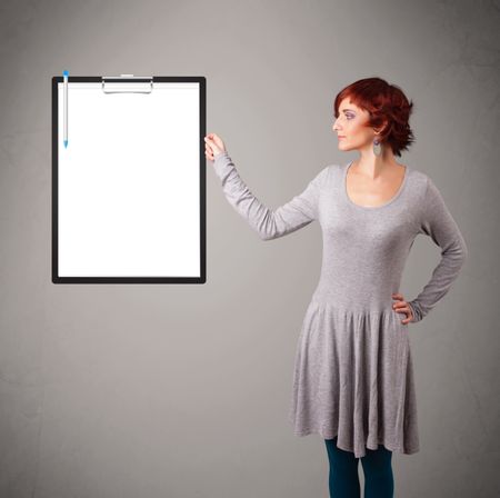 Beautiful young girl holding black folder with white sheet copy space