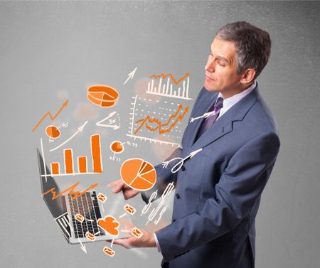 Businessman in suit holding notebook with graphs and statistics